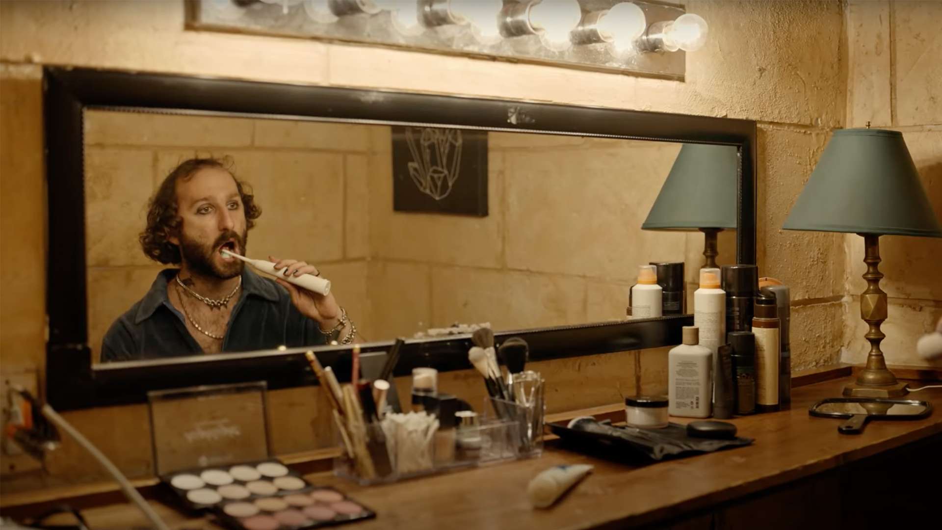 man brushing teeth