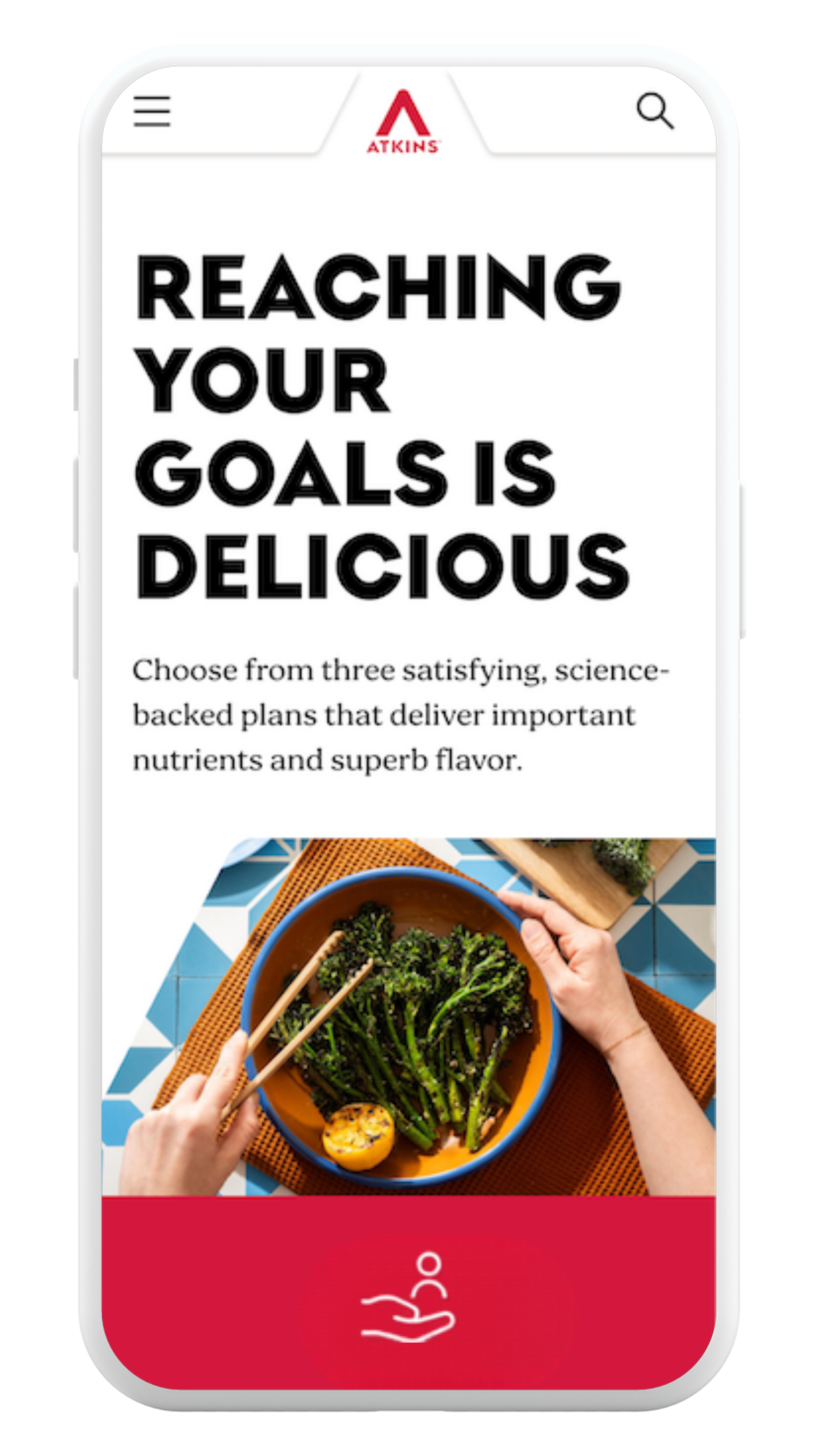 A phone screen showing an Atkins page, with phrase "Reaching Your Goals Is Delicious"