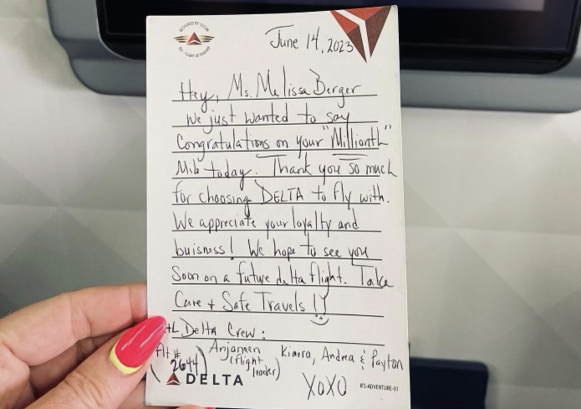 a handwritten letter that congratulates a customer for reaching Delta Air Line's 1 Million Miles loyalty status